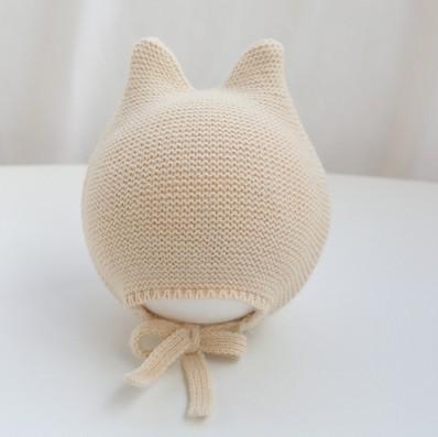 Spring and autumn super cute lace-up knitted pullover cap ear protection cap 16.9-18.8 inches