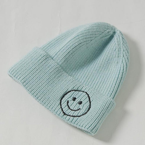 Embroidered wool smiling face hat 12.59-18.89 inches
